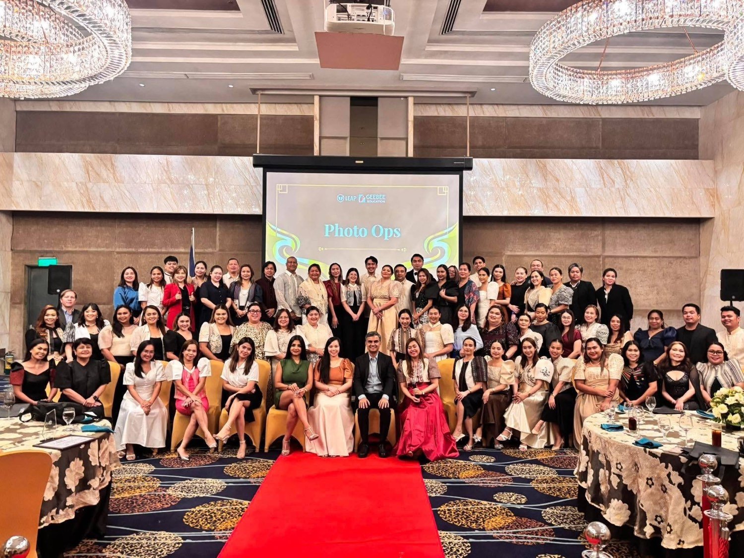 Kagayakashii Mirai team members with partners at the LEAP and GeeBee Education event